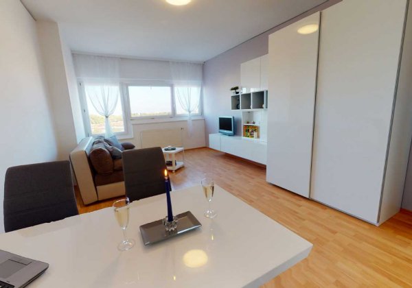Apartmenthaus Neue Donau Wohn-Schlafzimmer 1